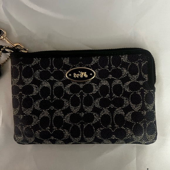 Coach Handbags - Coach Purple Signature Jacquard Wristlet